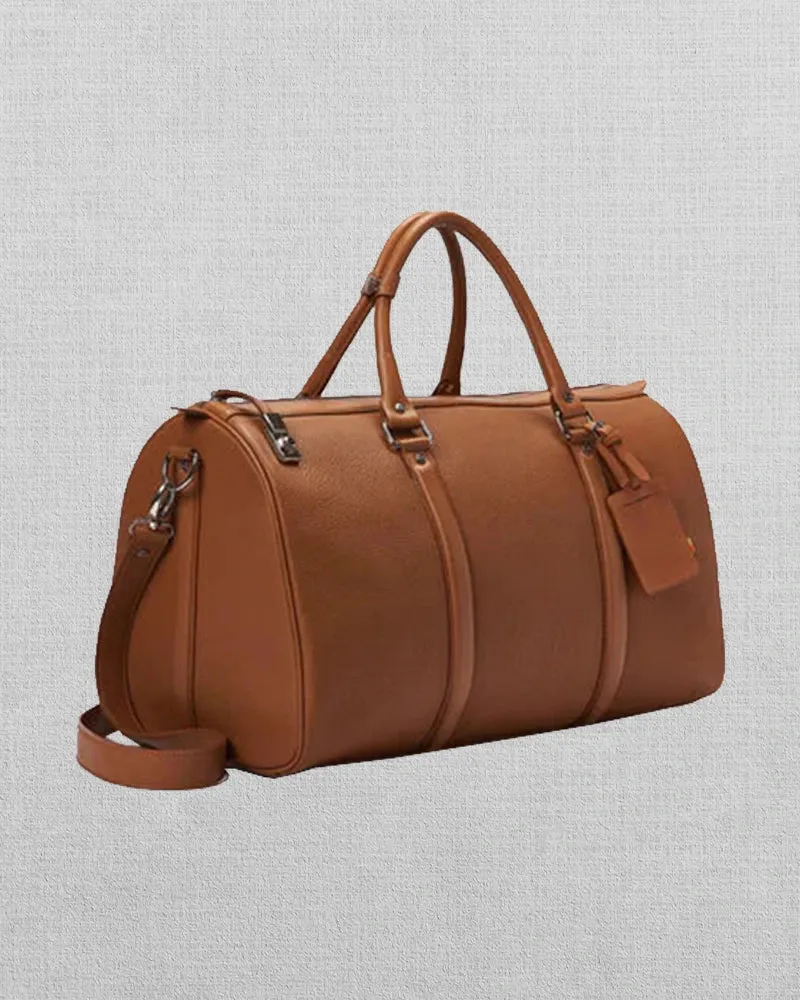 TAN LEATHER DUFFEL BAG WITH LOCK CLOSURE