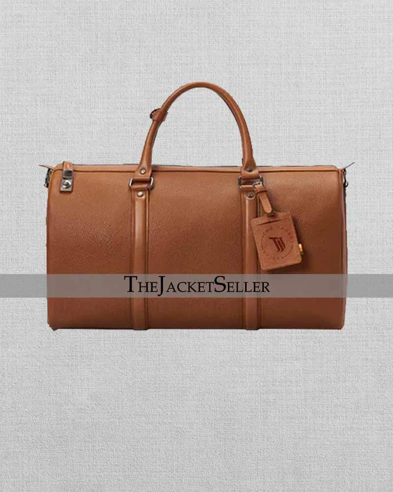 TAN LEATHER DUFFEL BAG WITH LOCK CLOSURE