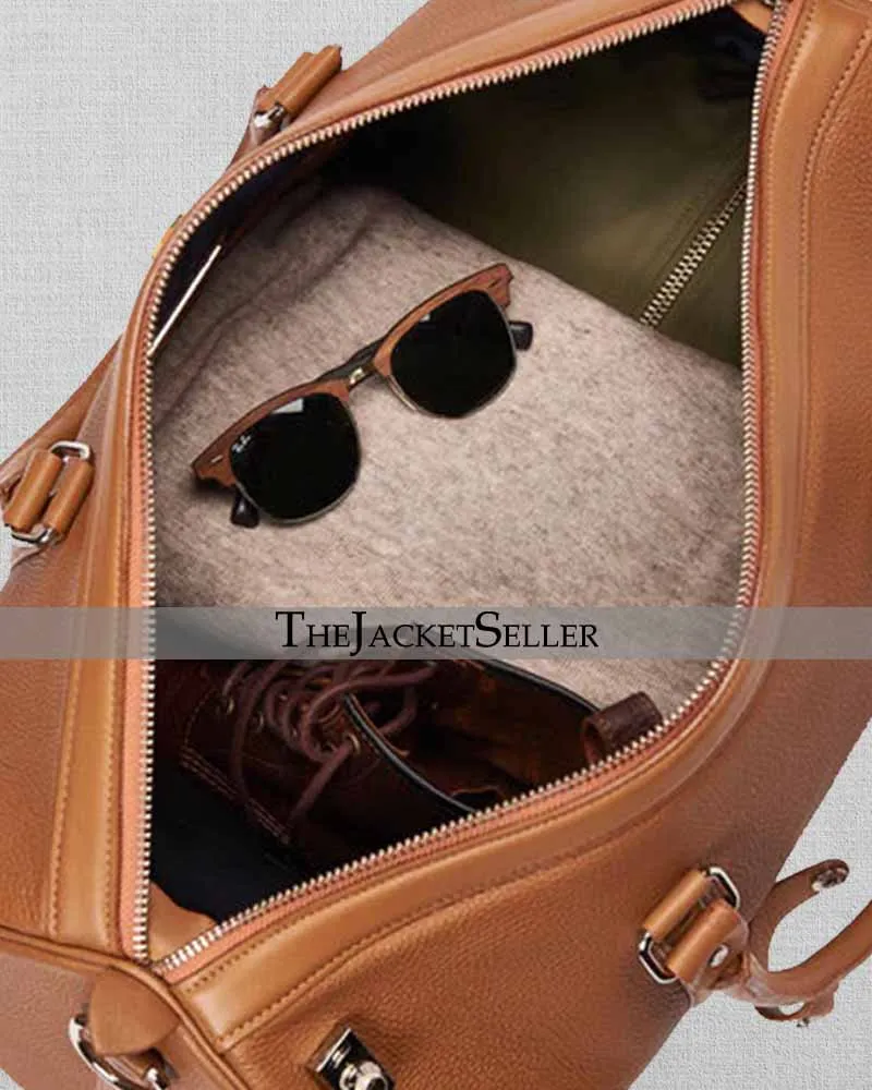 TAN LEATHER DUFFEL BAG WITH LOCK CLOSURE